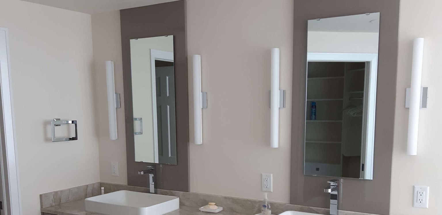 Custom dual bathroom mirrors in Naples, Florida